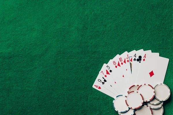 Wild Coaster blackjack table with professional dealer and player cards visible